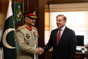 Prime Minister Shehbaz Sharif congratulating General Aamer Raza during Aamer Raza Appointment as Commander of National Strategic Command in Islamabad