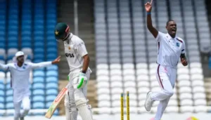 West Indies bowler celebrates as Pakistan batter walks away during the first Test, highlighting Abbas three wickets in Pakistan's push for victory.