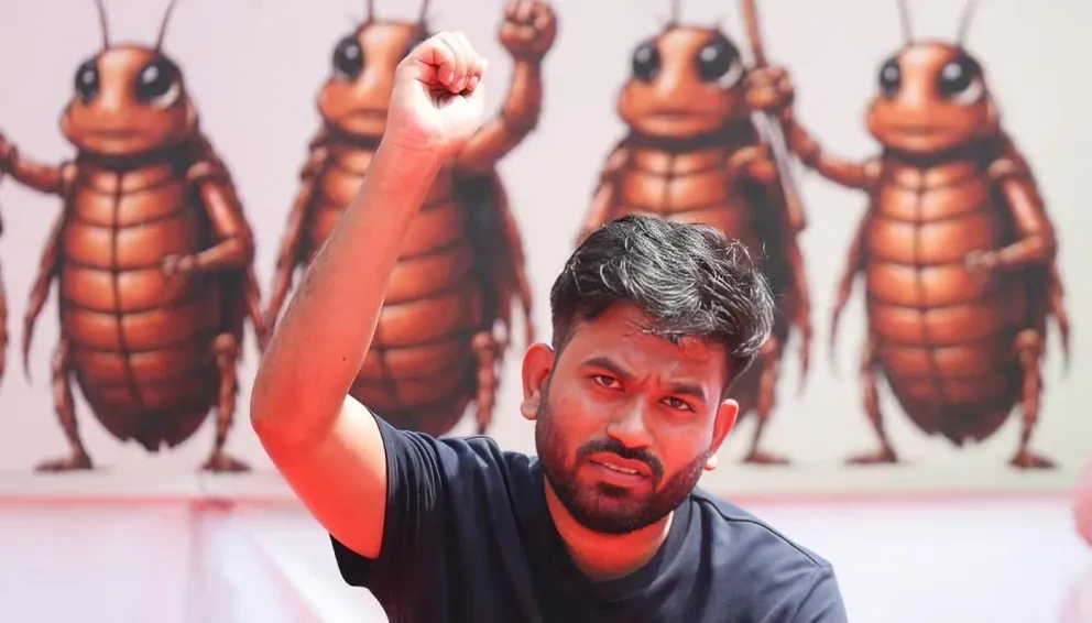 Abhijeet Dipke raises his fist while addressing supporters during India's Gen Z protest movement.