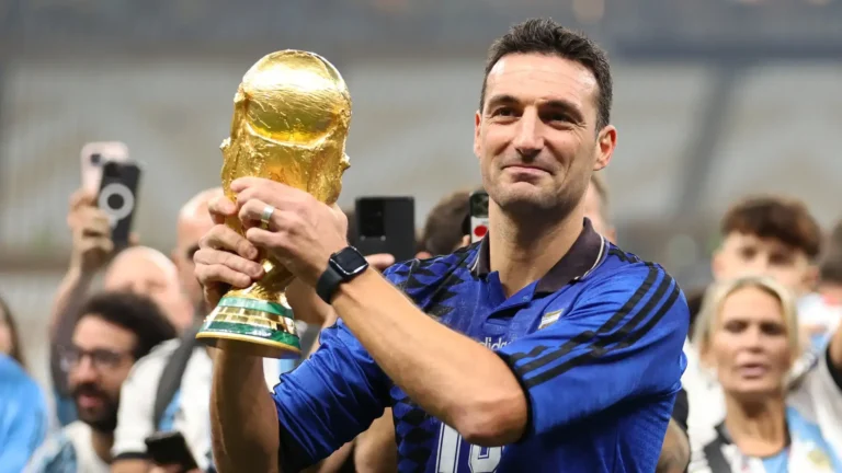 Lionel Scaloni holds the FIFA World Cup trophy ahead of Argentina's quarter final as Argentina Legacy inspires the defending champions.