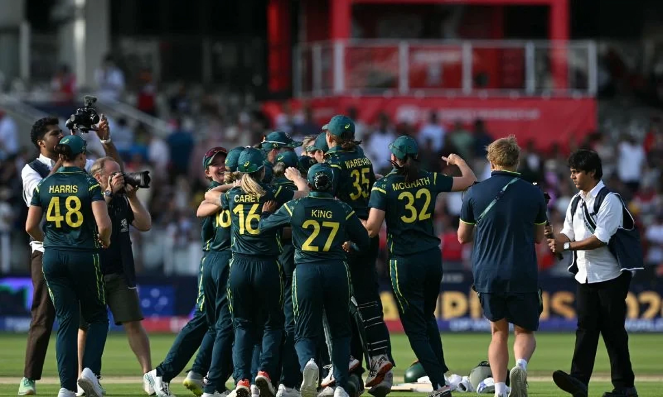 Australia Women's T20 team celebrates after defeating England to win the ICC Women's T20 World Cup final at Lord's.