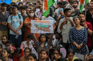Cockroach Movement supporters gather during a protest in New Delhi demanding action over exam paper leaks.