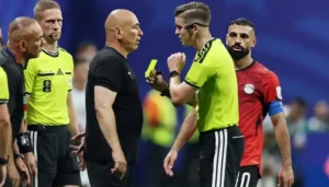 Egypt coach Hossam Hassan argues with referee Francois Letexier during the World Cup match as Egypt Referee Complaint follows the controversial defeat to Argentina.