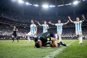 emotional moment in packed stadium with celebrating players