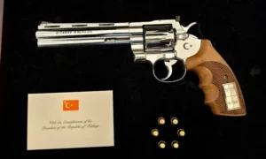 Erdogan Revolver displayed in a presentation box with ammunition, gifted to NATO leaders during the Ankara summit.