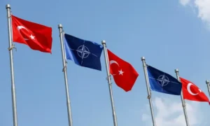 F110 engines discussion highlighted as NATO and Turkish flags fly ahead of the summit where Türkiye seeks approval for KAAN fighter jet engines.