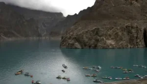 Boats on Attabad Lake as GLOF Advisory is issued for northern areas due to glacial lake outburst flood risk.