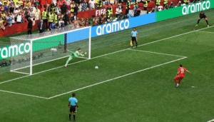 Switzerland goalkeeper Gregor Kobel saves a penalty during the Switzerland Quarter Final against Colombia in the FIFA World Cup.