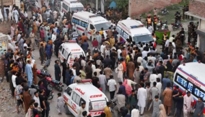 Rescue teams and ambulances at the scene of the Lahore Roof Collapse after a tuition centre roof collapsed in Kahna area