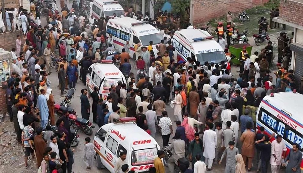 Rescue teams and ambulances at the scene of the Lahore Roof Collapse after a tuition centre roof collapsed in Kahna area