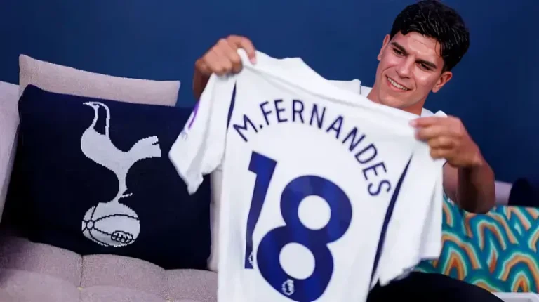 Mateus Fernandes holding his Tottenham Hotspur jersey after completing his record transfer to Spurs.