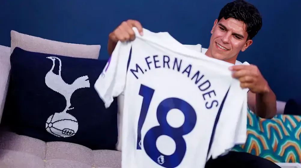 Mateus Fernandes holding his Tottenham Hotspur jersey after completing his record transfer to Spurs.