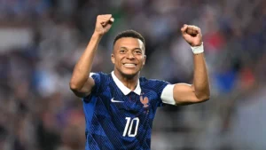 Kylian Mbappe celebrates after scoring for France during the FIFA World Cup match as he focuses on the Mbappe World Cup trophy dream.