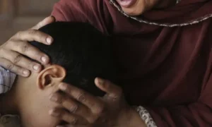 Grieving mother mourns her son after the Minor Boy Murder case in Karachi.