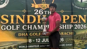 Omar Khalid holding the Sindh Open Golf Championship trophy after becoming the first amateur to win the tournament in Karachi.