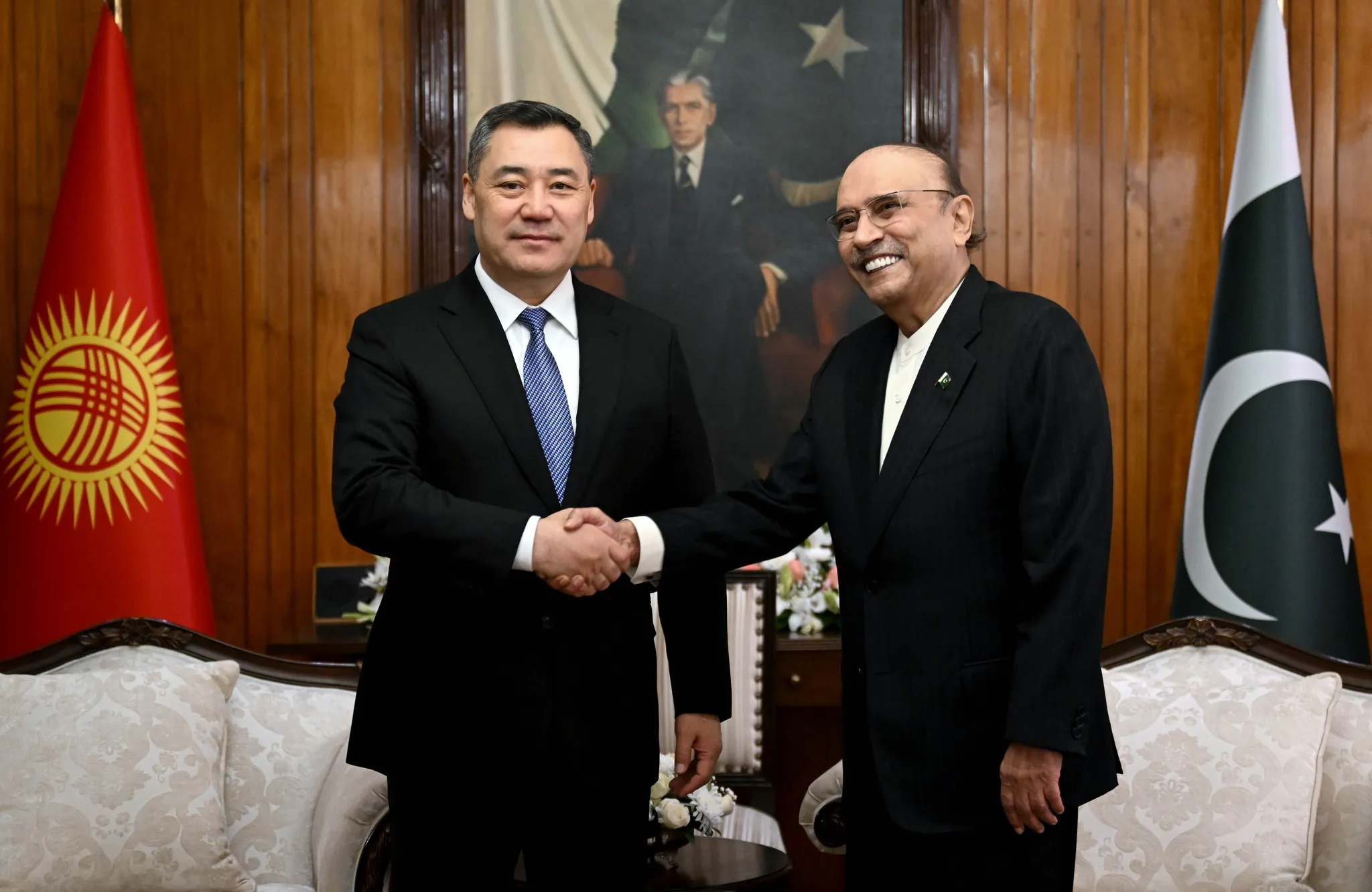 Pakistan Kyrgyzstan leaders President Asif Ali Zardari and President Sadyr Japarov shake hands during an official meeting to strengthen bilateral cooperation.