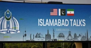 Islamabad Talks billboard displaying the flags of Pakistan, the United States, and Iran, highlighting Pakistan Middle East diplomatic efforts.