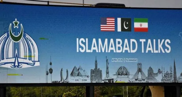 Islamabad Talks billboard displaying the flags of Pakistan, the United States, and Iran, highlighting Pakistan Middle East diplomatic efforts.