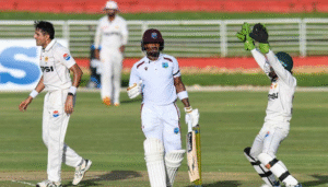 Pakistan players appeal for a wicket during the Pakistan vs West Indies Test match as the West Indies batter stands at the crease.