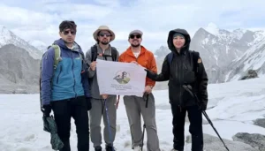 Pakistani mountaineers pose at Phargam An Pass in the Hindu Kush after successfully reopening the historic mountain route following 27 years.