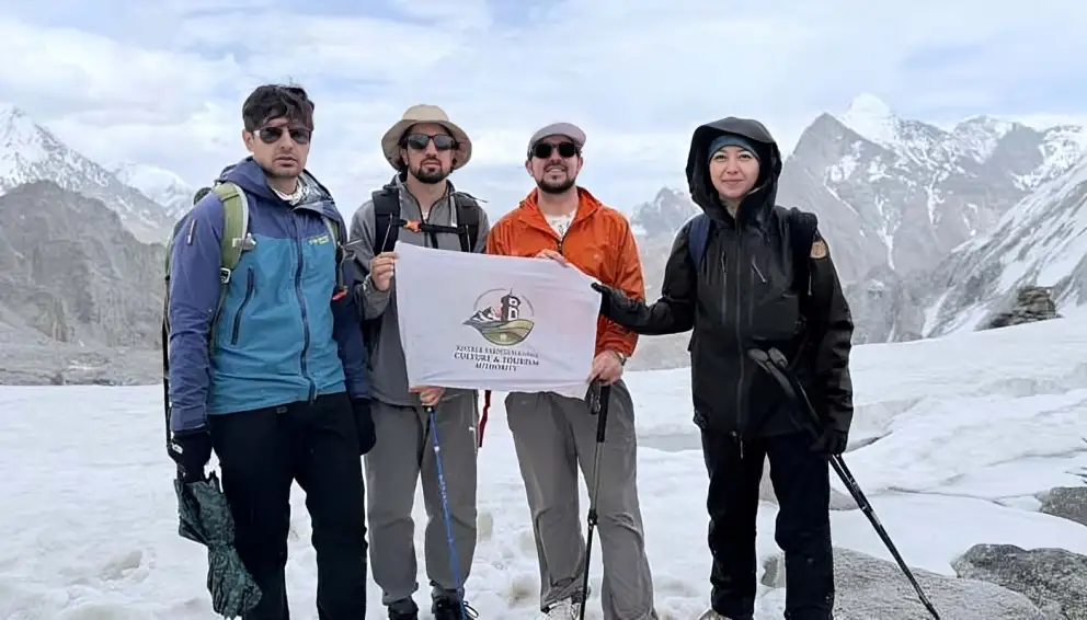 Pakistani mountaineers pose at Phargam An Pass in the Hindu Kush after successfully reopening the historic mountain route following 27 years.