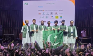 Pakistan Physics Olympiad team posing with the national flag after winning three bronze medals at the 56th International Physics Olympiad in Colombia.
