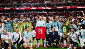 Cristiano Ronaldo and Portugal teammates holding Diogo Jota’s number 21 jersey during the Ronaldo Jota Tribute after World Cup victory
