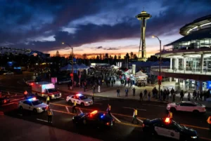 Emergency police and ambulance response at Seattle Center near Space Needle after Seattle mass shooting during food festival