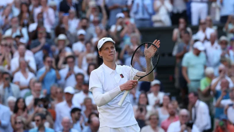 Jannik Sinner acknowledges the crowd after reaching the Sinner Wimbledon final with a straight sets win over Novak Djokovic.