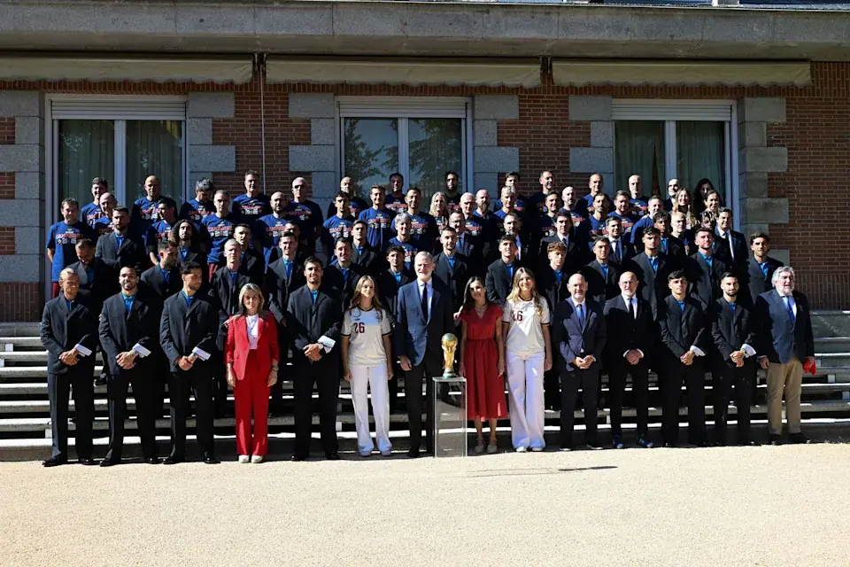 Spain World Cup champions pose with King Felipe VI, the royal family, and the FIFA World Cup trophy during the official welcome ceremony in Madrid.