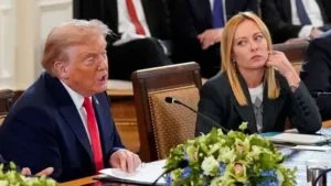 US President Donald Trump speaks during a meeting as Italian Prime Minister Giorgia Meloni listens during discussions on Trump Meloni relations.