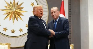 US President Donald Trump shakes hands with Turkish President Recep Tayyip Erdogan during talks on Trump Turkiye relations and F 35 fighter jet discussions.