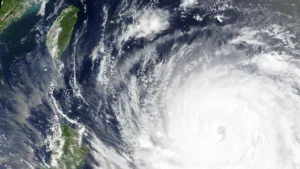 Satellite image of Typhoon Bavi approaching Japan's southwestern islands and Taiwan with powerful winds and heavy rain.