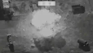 US strikes Iran as an explosion is seen during reported military operations