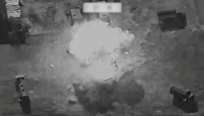 US strikes Iran as an explosion is seen during reported military operations