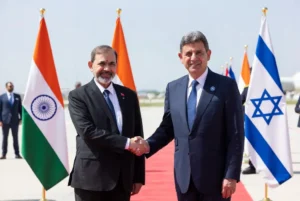 Indian and Israeli leaders shaking hands during formal meeting linked to India arms Israel partnership