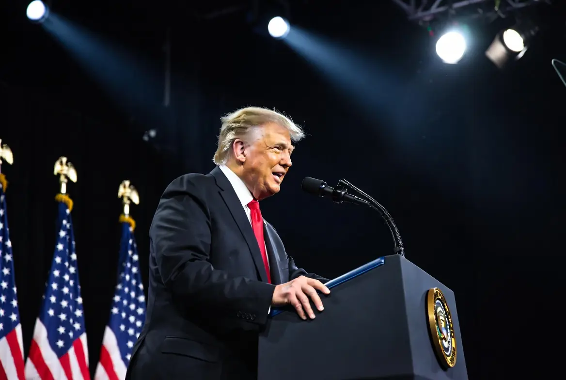 President Donald Trump speaking at podium rejecting reports of munitions shortages with American flags in background