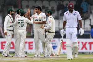 Pakistan players celebrate an early wicket during the rain affected Pakistan West Indies Test at Queen's Park Oval.