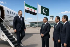 Syrian Foreign Minister Asaad Hassan Al-Shaibani arrives at Islamabad International Airport on official visit, welcomed by Pakistani officials under Syrian and Pakistani flags