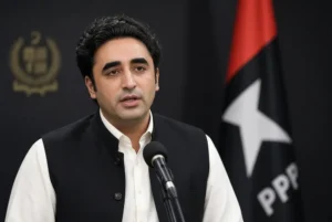 PPP Chairman Bilawal Bhutto Zardari speaking at a press conference denying Bilawal engagement reports with PPP flag in the background