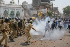 Police and protesters clash during demonstrations over the partial demolition of a mosque in Ujjain, Madhya Pradesh, amid a road widening project and heightened security measures.