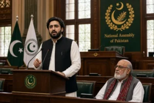 Bilawal Bhutto Zardari speaking at the National Assembly podium as he urges opposition to join parliamentary committees with Mahmood Khan Achakzai seated nearby