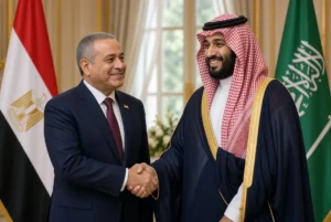Egyptian President Abdel Fattah al-Sisi and Saudi Crown Prince Mohammed bin Salman shaking hands in a formal meeting representing Egypt Saudi support