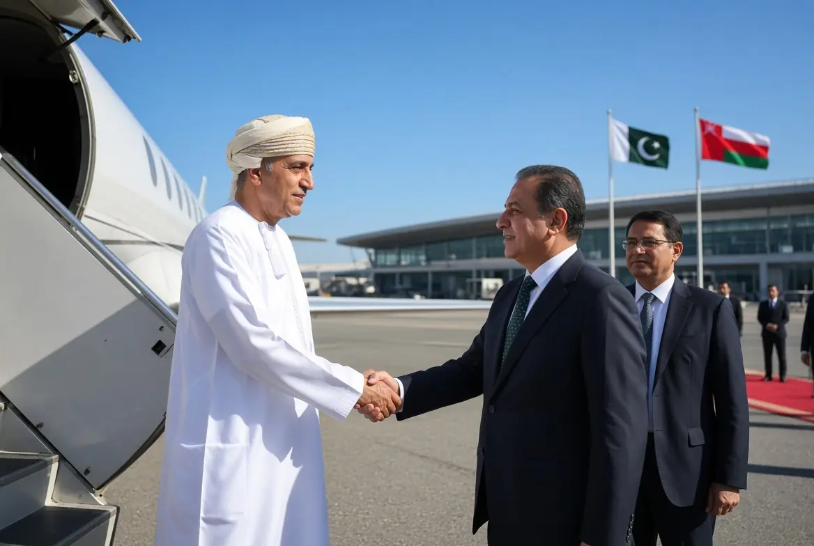 Oman FM Pakistan - Omani Foreign Minister Sayyid Badr Albusaidi in traditional attire shaking hands with a Pakistani official at Islamabad airport during official visit for Joint Ministerial Commission talks
