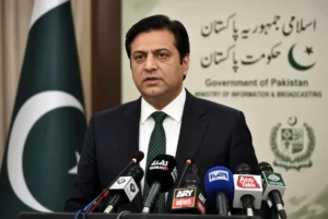 Senator Faisal Vawda addressing press conference on Vawda KP emergency in Islamabad with Pakistani flag and news microphones
