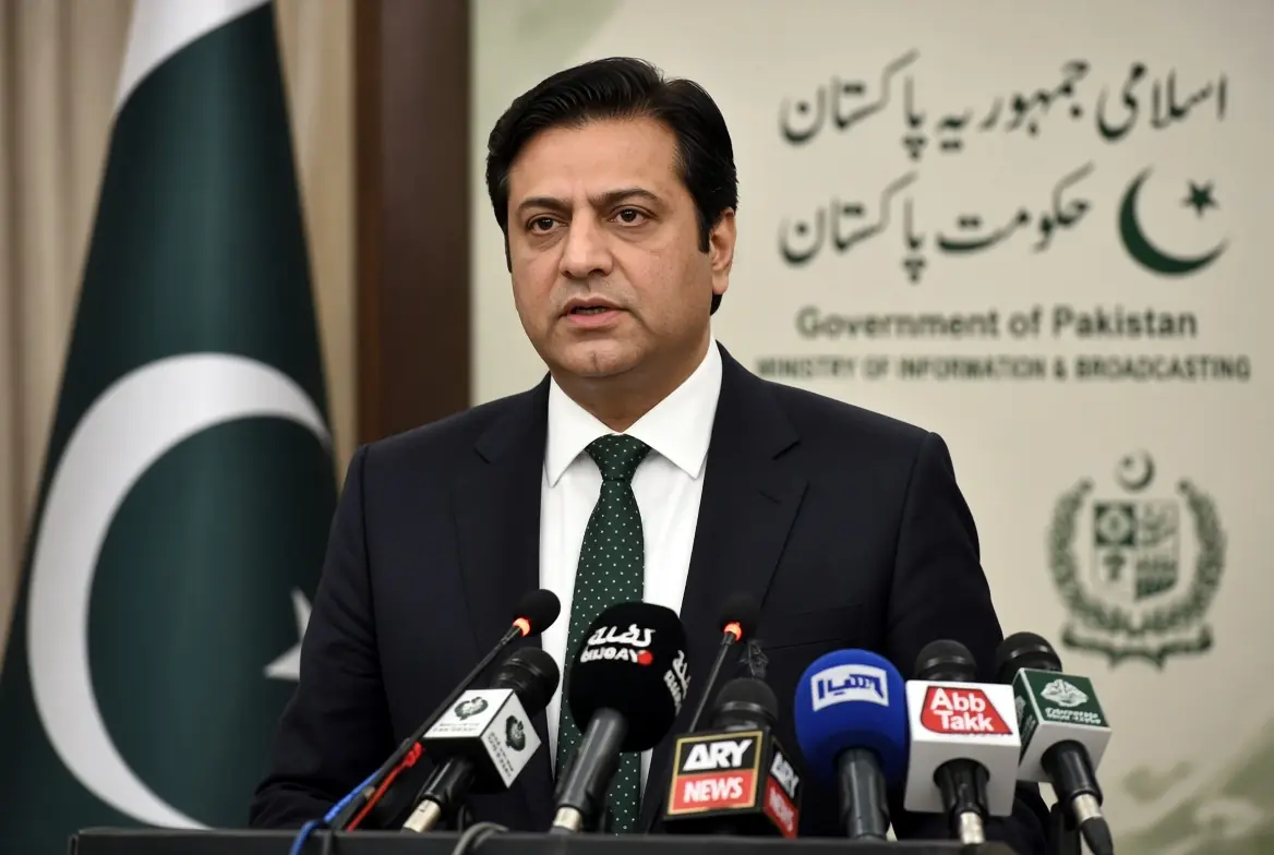 Senator Faisal Vawda addressing press conference on Vawda KP emergency in Islamabad with Pakistani flag and news microphones